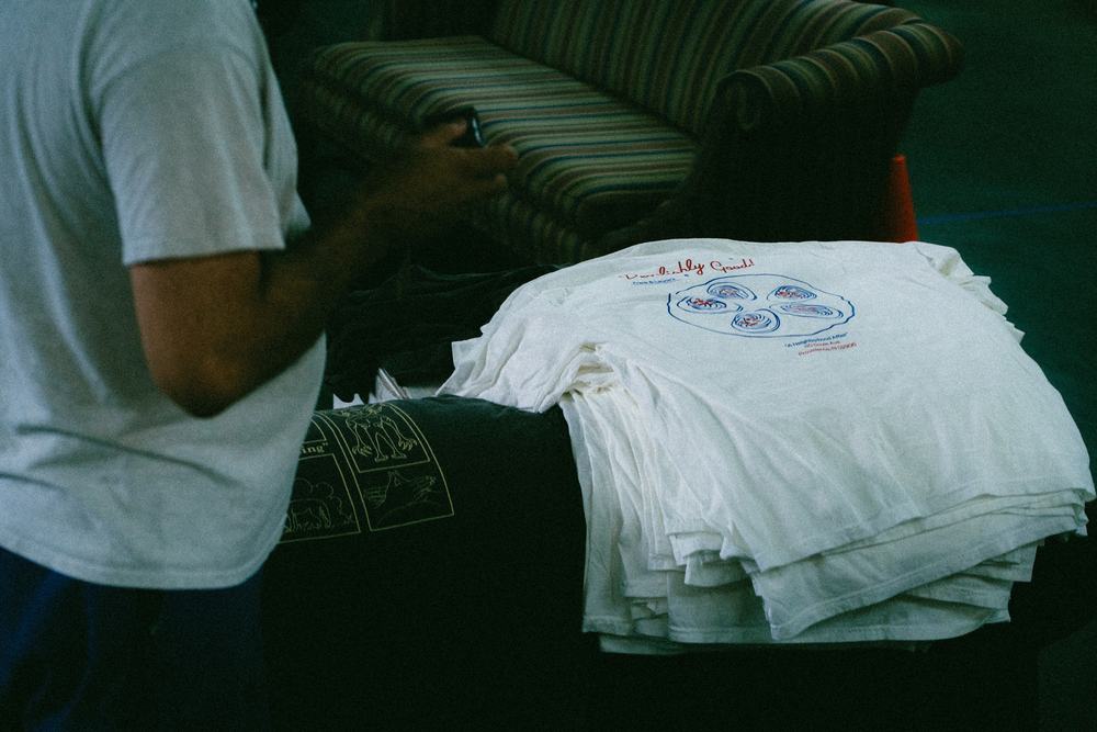 Counting and folding the finished Frank & Laurie’s run on the shop couch.